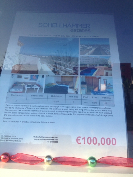 4113 12-12 Estate agent's window